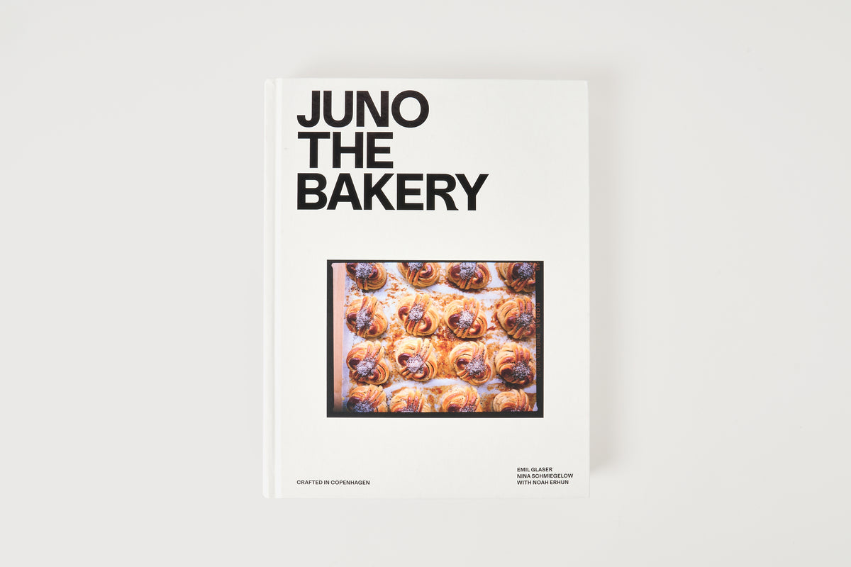 Book titled 'Juno the Bakery' with a photo of pastries on a white background