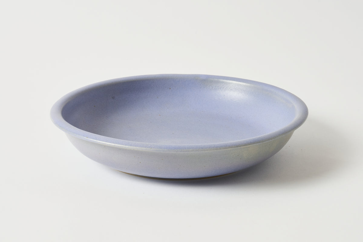 purple ceramic bowl on a white background