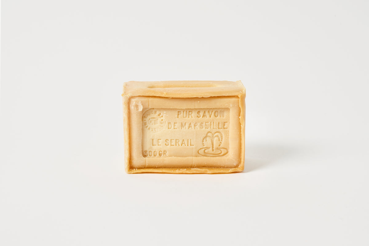 Bar of soap with branding on a white background