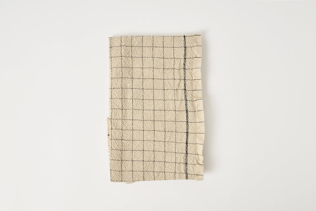 Textile with grid pattern on a white background