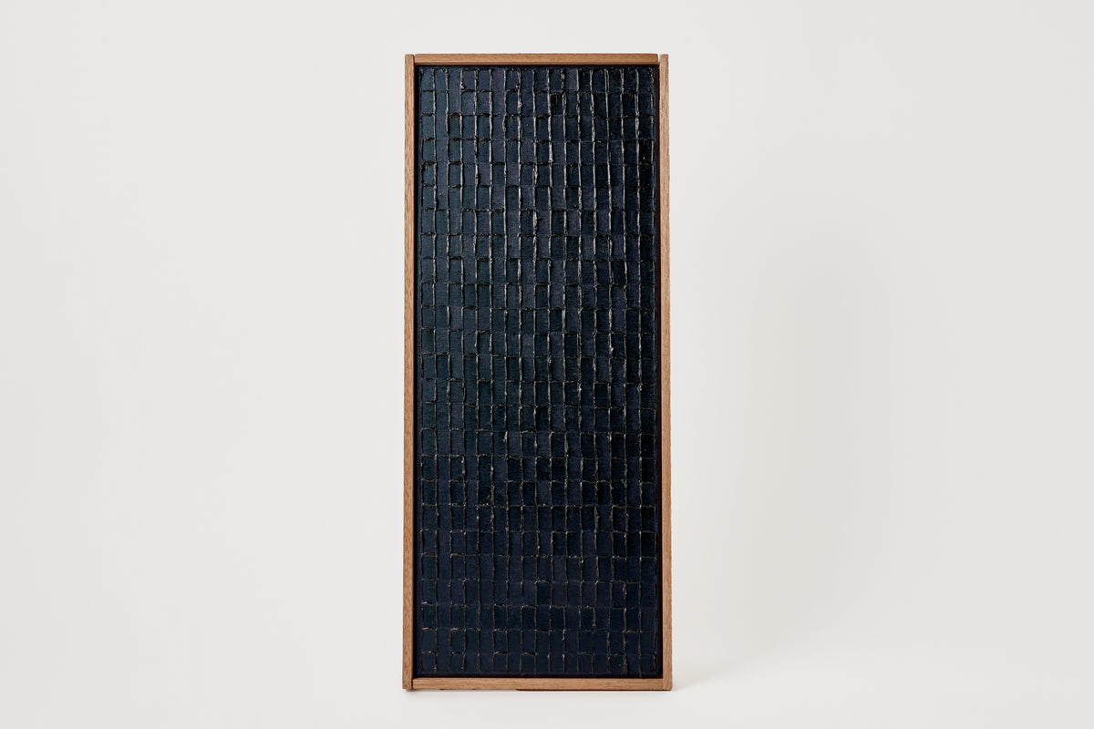 Rectangular black textured panel with wooden frame on a white background